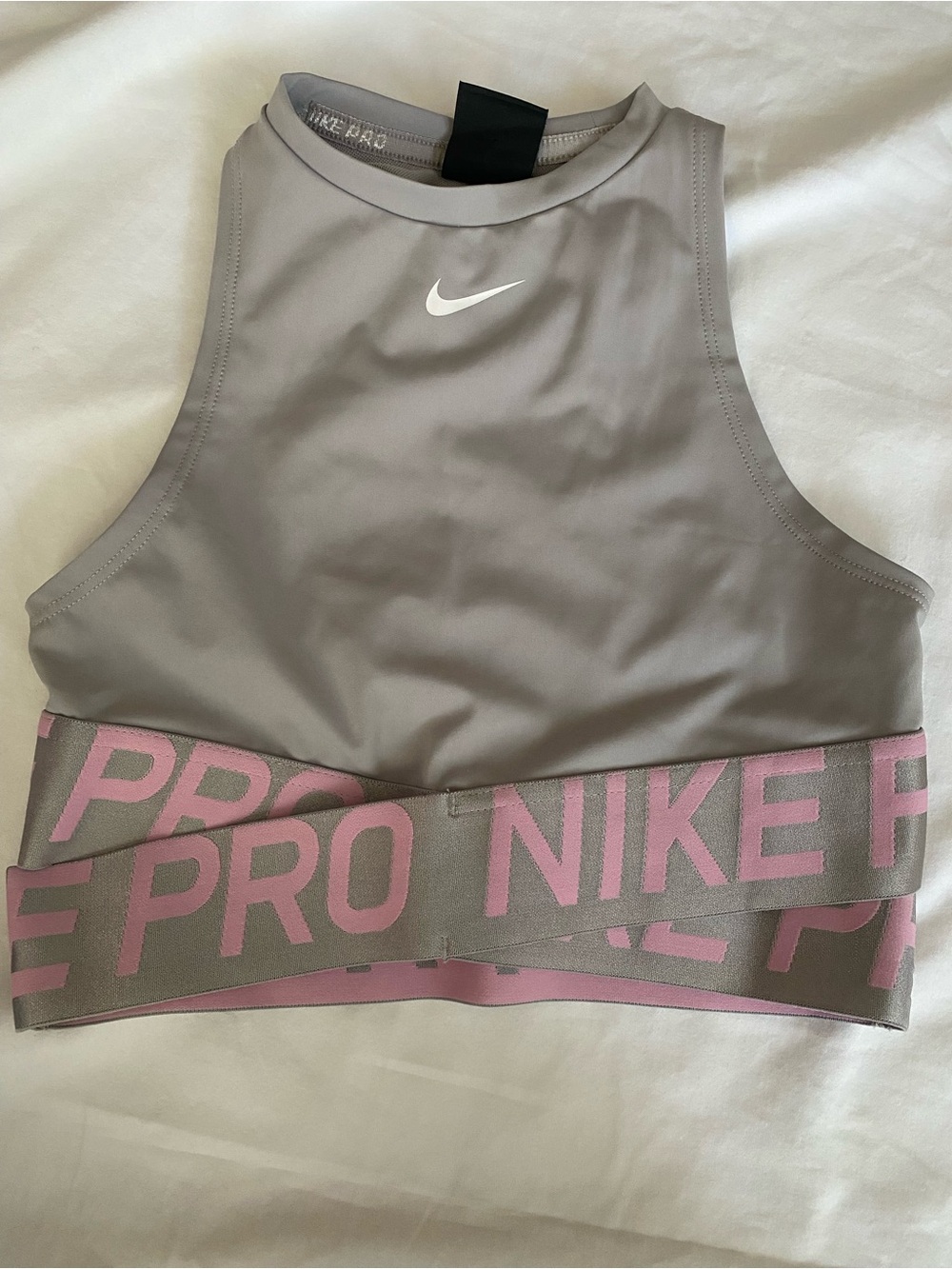 Nike High-Neck Crop Sports Bra in Gray with Pink Logo Band